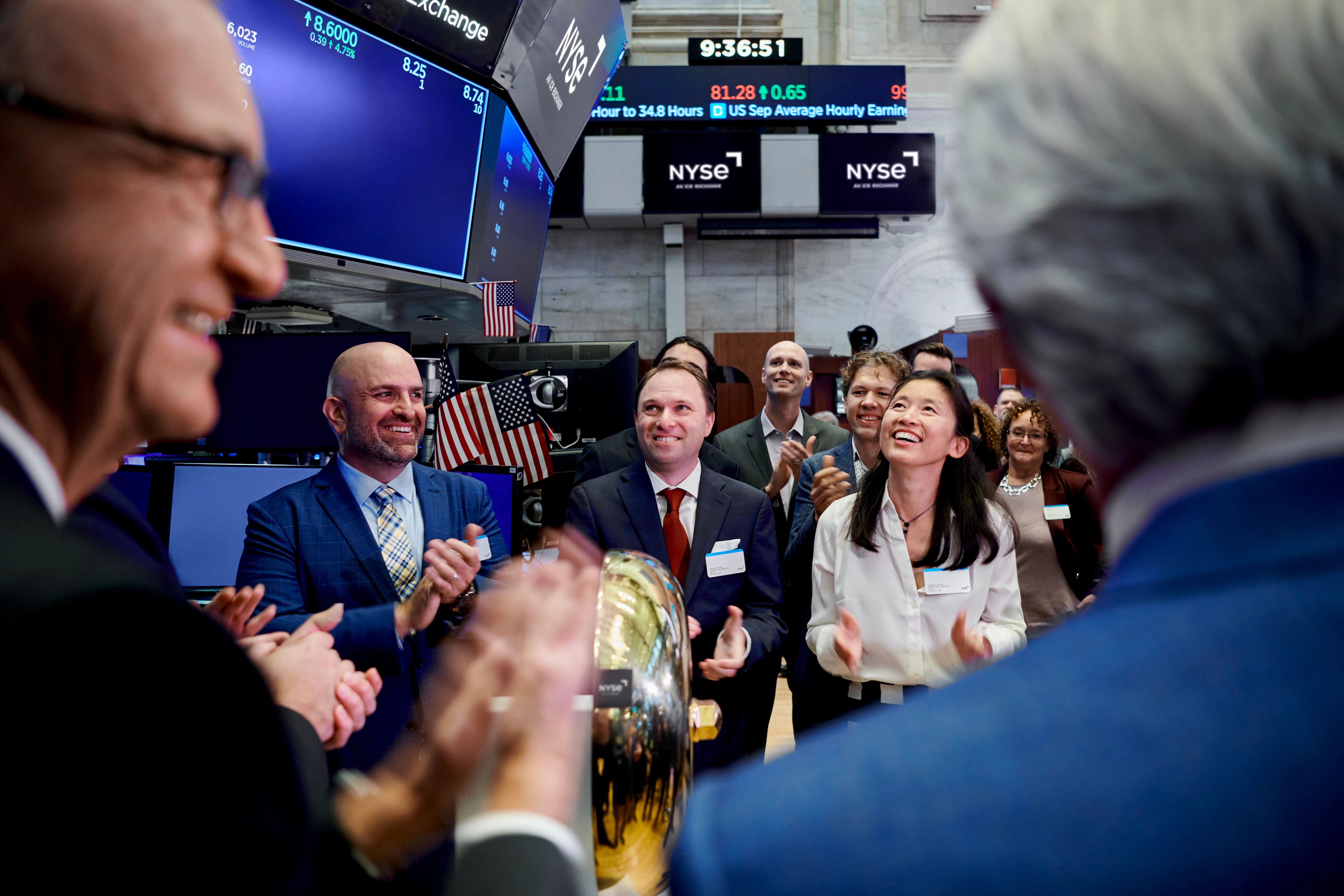 people on the floor of new york stock exchange